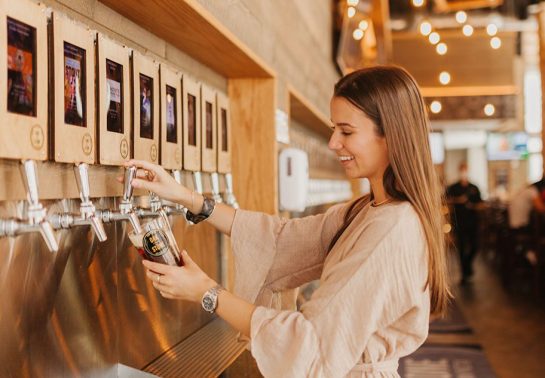 woman pouring beer